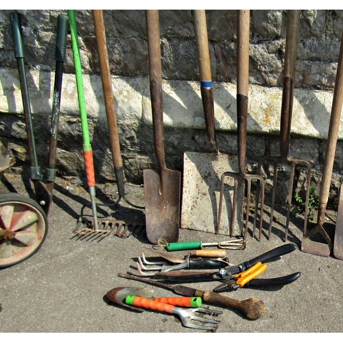 2075 - A small wheelbarrow with galvanised body together with a collection of hand tools