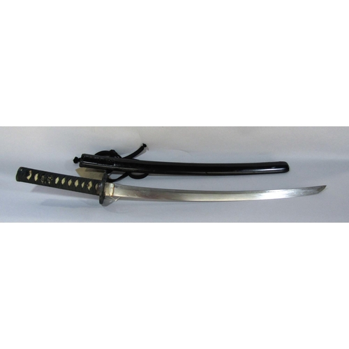 1485A - A Japanese sword with black lacquered scabbard with paperwork