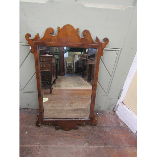 2739 - A Georgian rectangular mahogany wall mirror, within a shaped frame, 85cm long x 53cm wide