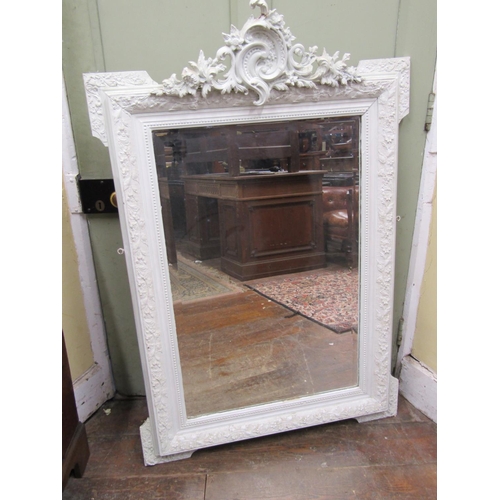 2747 - A 19th century wall mirror with moulded detail  and turreted corner, painted, 135 x 90cm