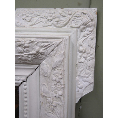 2747 - A 19th century wall mirror with moulded detail  and turreted corner, painted, 135 x 90cm