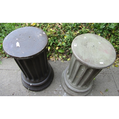 2035 - A pair of cast composition stone cylindrical fluted pedestals in varying painted colourway, the tops... 