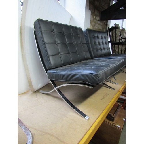 2200 - A pair of Barcelona style chairs, after Mies van der Rohe, chromium plated X frame with black button... 