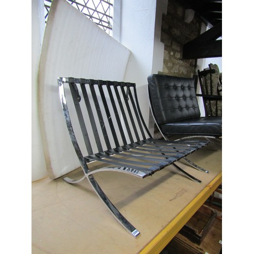 2200 - A pair of Barcelona style chairs, after Mies van der Rohe, chromium plated X frame with black button... 