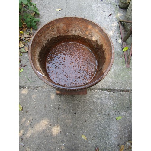 2026 - An old weathered cast iron circular planter raised on an associated pedestal 40 cm diameter x 53 cm ... 