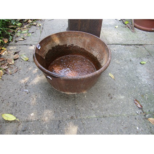 2026 - An old weathered cast iron circular planter raised on an associated pedestal 40 cm diameter x 53 cm ... 