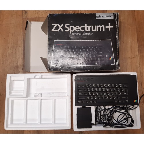 236 - Spectrum ZX personal computer, keyboard with handbook, 1983.  A quantity of Spectrum games, cassette... 