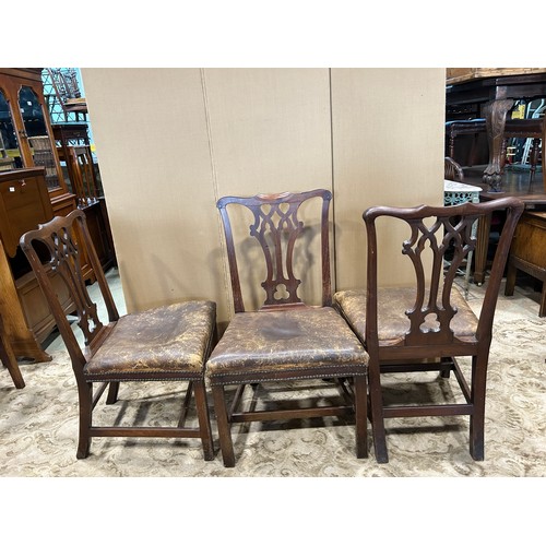 2201 - A set of three George III mahogany dining chairs, with carved and pierced splats, together with two ... 