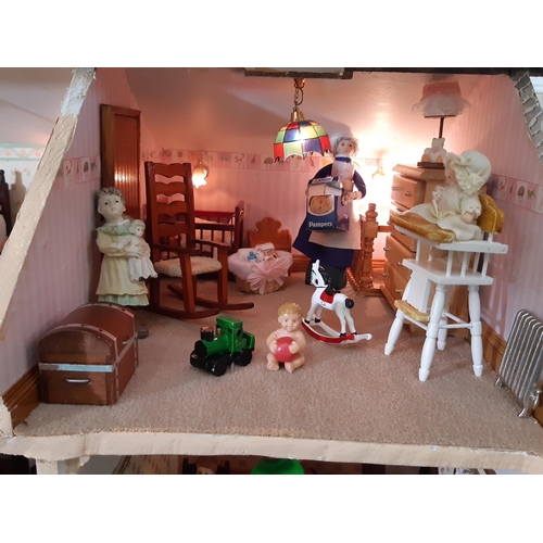 253 - 'Bridal Gowns etc'- an impressive and finely detailed period style dolls house shop comprising 3 sto... 