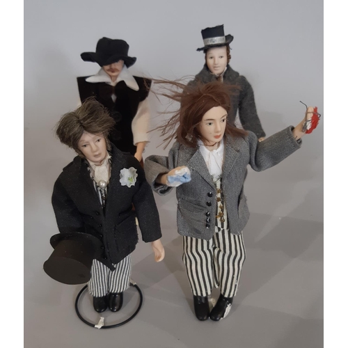 256 - A collection of 30 dolls house period character figures including ladies, gentlemen, staff, a police... 