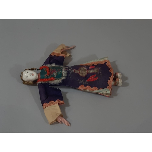 280 - Two early 20th century Chinese 'Opera' dolls, with long puppet-style hands, wearing traditional embr... 