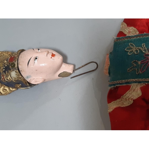 280 - Two early 20th century Chinese 'Opera' dolls, with long puppet-style hands, wearing traditional embr... 