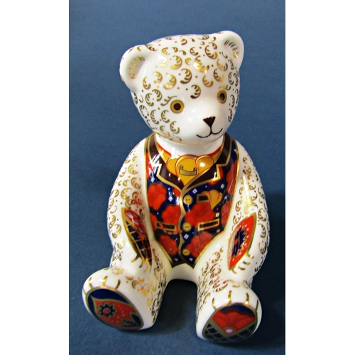 1064 - A Crown Derby collection of bears (4) including seated bear in a colourful waistcoat, Claude bear (t... 