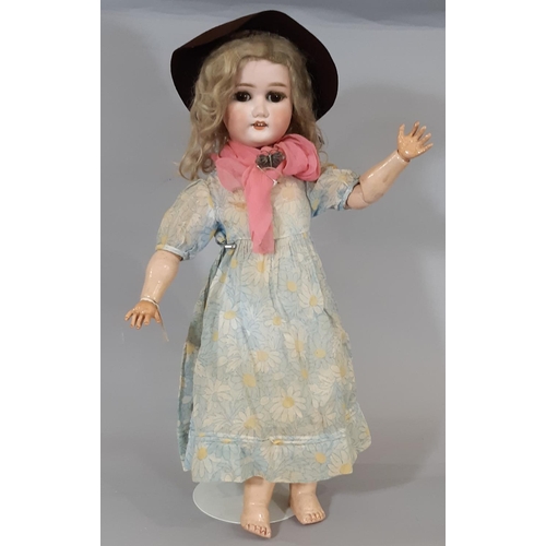 276 - Early 19th century German bisque head doll by Shoenau & Hoffmeister circa 1910 with brown closing ey... 