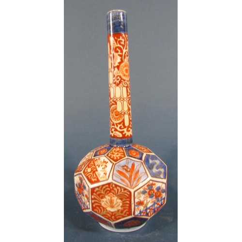 1074 - An Imari vase with panelled base and drawn neck, an Imari bowl and dish and a further Chinese export... 