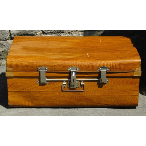 2132 - An antique steel travelling trunk with original wood grained finish and chrome mounts