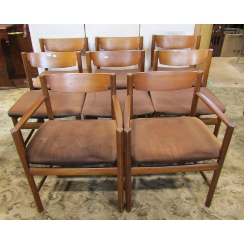 2139 - A set of 8 (6&2) teakwood dining chairs with upholstered seats and bar backs