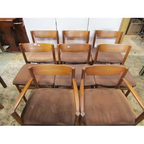 2139 - A set of 8 (6&2) teakwood dining chairs with upholstered seats and bar backs