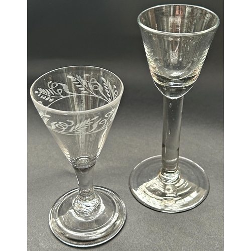 1165 - A 19th century small round funnel wine glass on a plain stem and a 19th century engraved conical win... 