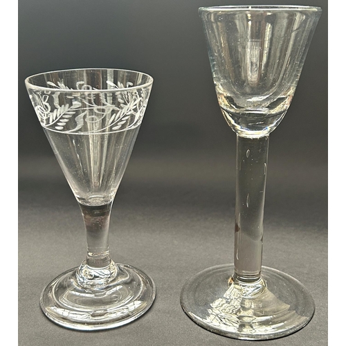 1165 - A 19th century small round funnel wine glass on a plain stem and a 19th century engraved conical win... 