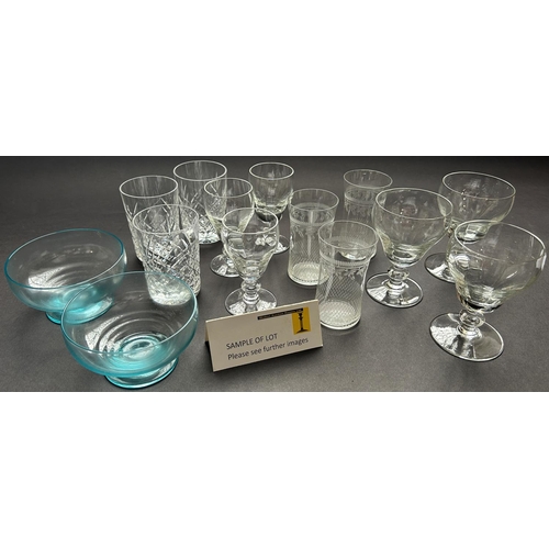 1168 - A large selection of drinking glasses including a lemonade jug and six colourful glasses, further mu... 