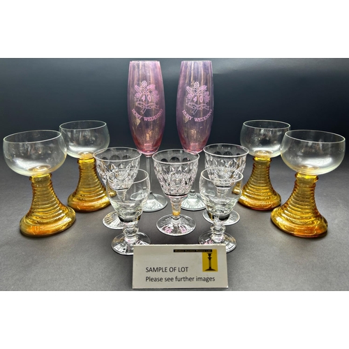 1168 - A large selection of drinking glasses including a lemonade jug and six colourful glasses, further mu... 