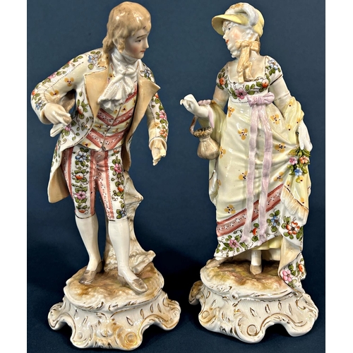 1085 - A pair of 19th century continental porcelain figures male and female characters in 18th century dres... 