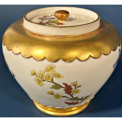 1091 - A Worcester porcelain oviform jar and cover with hand painted floral spray detail within gilded bord... 