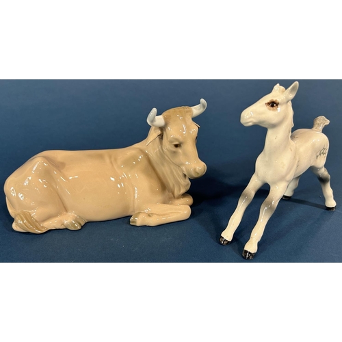 1092 - Two Crown Derby Imari cats both with silver stoppers and a Nao recumbent cow, Beswick foal, a polar ... 