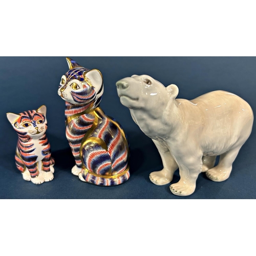 1092 - Two Crown Derby Imari cats both with silver stoppers and a Nao recumbent cow, Beswick foal, a polar ... 