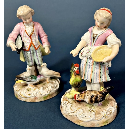 1094 - A pair of 19th century German figures, male and female characters feeding doves and chickens by Erne... 