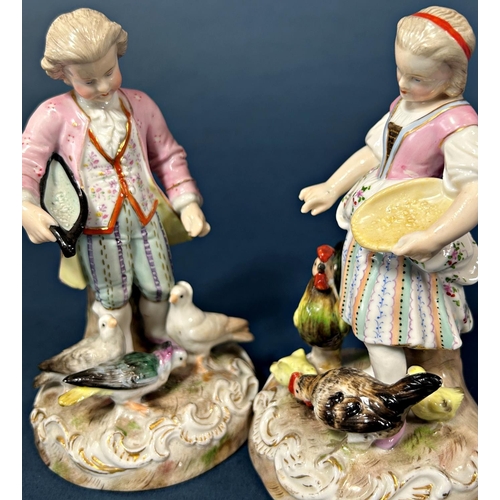 1094 - A pair of 19th century German figures, male and female characters feeding doves and chickens by Erne... 