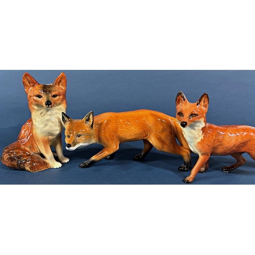 1095 - A collection of Beswick (mainly hunting related effects) including 7 hounds, 3 foxes and a huntsman