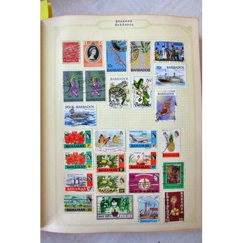 229 - A Simplex stamp album containing British stamps, mainly George VI and Elizabeth II, further worldwid... 