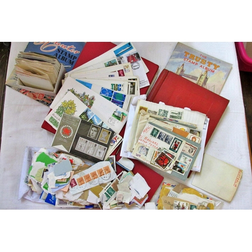 231 - A collection of stamp albums containing worldwide issues, mainly mid-20th century and later, further... 