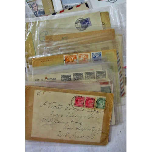 235 - A collection of Victorian and later franked envelopes, further loose stamps, quarter sheet of Bahrai... 