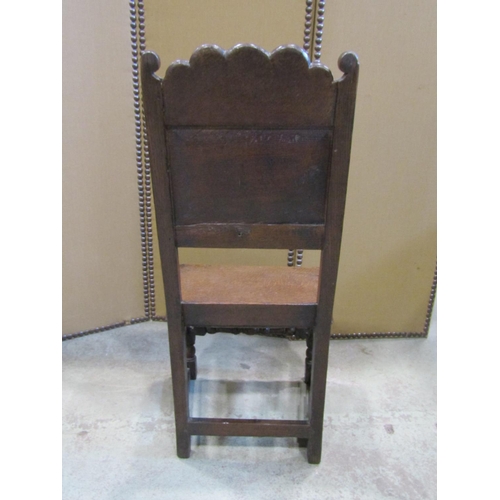 2242 - 18th century oak side chair with panelled seat and back, the back set beneath a carved cresting rail... 