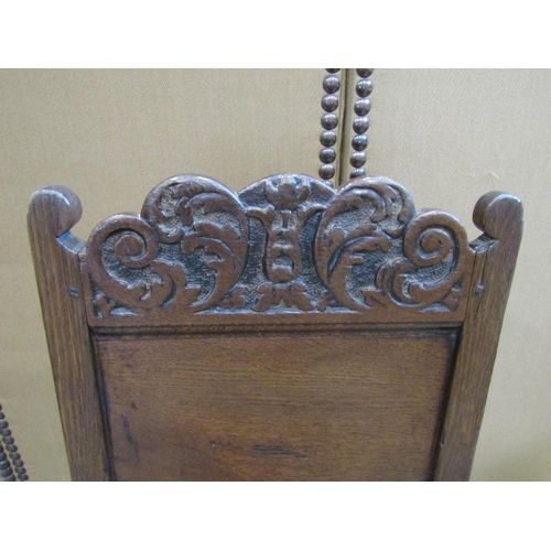 2242 - 18th century oak side chair with panelled seat and back, the back set beneath a carved cresting rail... 