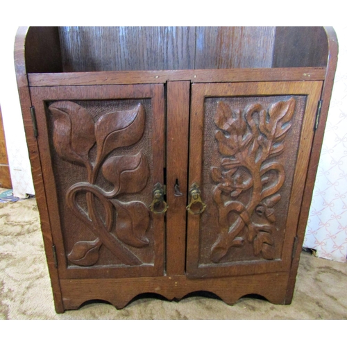 2293 - Late Victorian carved oak wall cabinet with oakleaf and other detail