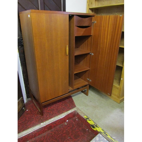 2312 - An E Gomme 'G' plan quadrill dwarf teak robe with partially fitted interior 91 cm wide x 46 cm deep ... 