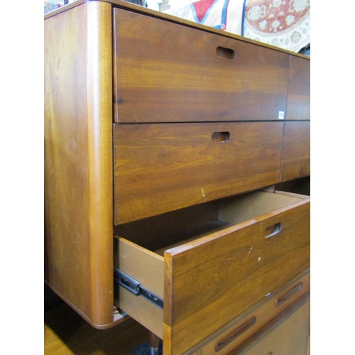 2299 - A contemporary chest of six drawer in a side by side arrangement on turned supports, 140cm wide