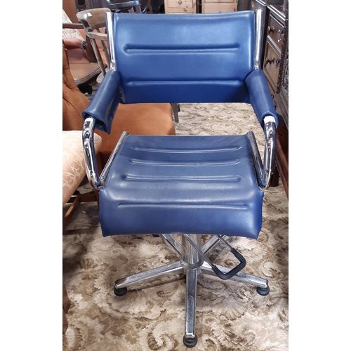 2325 - A vintage barbers/hairdressers chair with polished chrome framework and blue upholstery