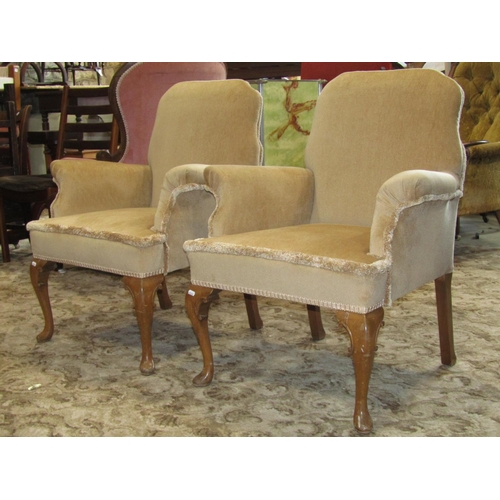 2330 - Pair of upholstered armchairs on cabriole legs