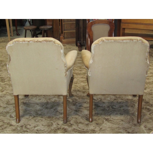 2330 - Pair of upholstered armchairs on cabriole legs