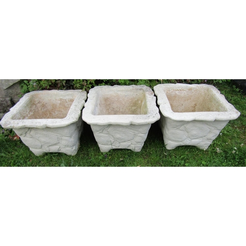 2057A - A set of three cast composition stone square tapered mock stone wall effect planters with painted fi... 