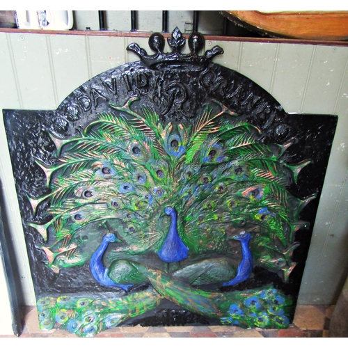 2077 - A painted plaster plaque with raised peacock relief beneath a crown and raised lettering, David R Cr... 