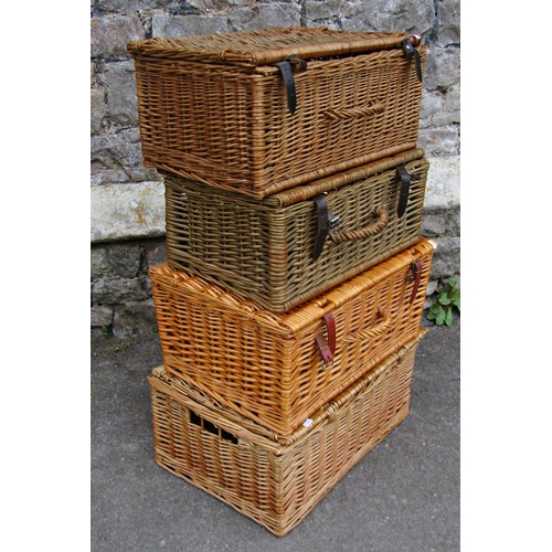 2229 - Four contemporary wicker hampers with leather straps, 52c long and smaller