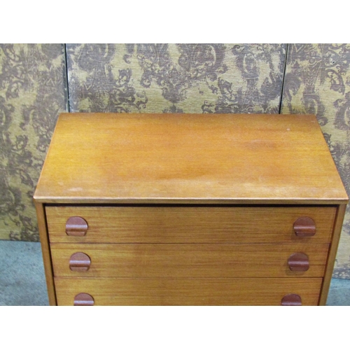 2296 - A Stag teakwood chest of four drawers 77 cm wide