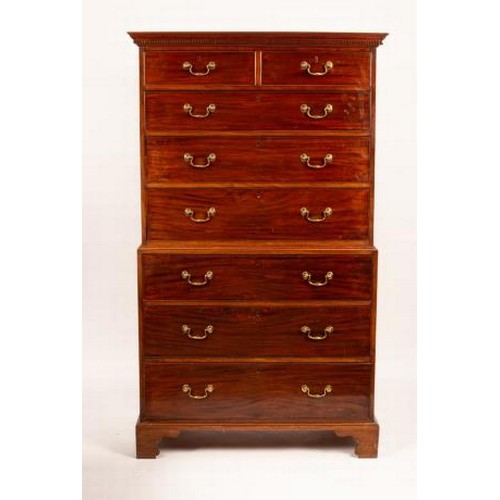 2602 - A George III mahogany tallboy chest with dentil cornice, fitted six long and two short drawers on br... 