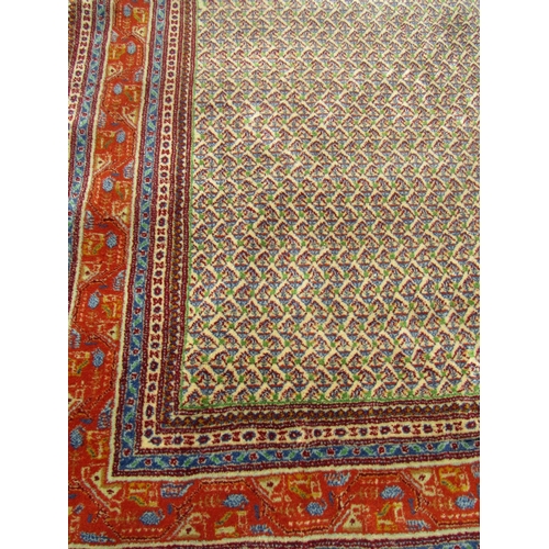 1675 - Persian Rug with intricate boteh design surrounded by multiple borders in vibrant tones of blue, cre... 